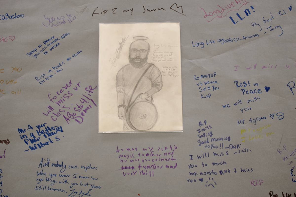 A tribute wall outside the music room, with portrait drawn by Jay Ayala, a junior