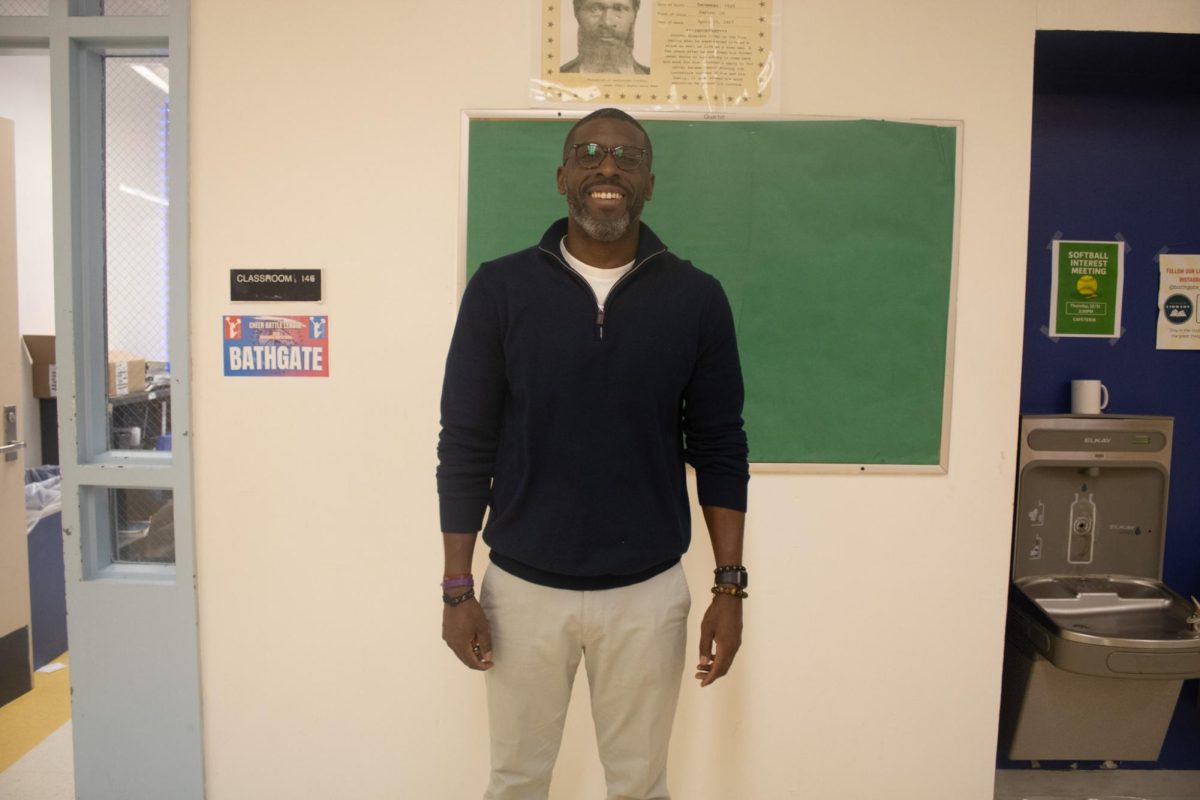 Mr. Latortue poses in the atrium. 
